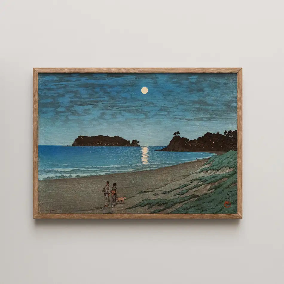 Hasui Kawase woodblock print of Shichirigahama, Sagami Province, two figures and a dog on a moonlit beach with the moon's light on the sea.