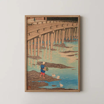 Hasui Kawase woodblock print of Gion Bridge at Hondo, Amakusa, a long wooden footbridge on pilings above a tidal flat where a child gathers greens.