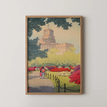 Hasui Kawase woodblock print of Hibiya Park in spring, a clock tower rising above blazing azalea beds as a mother and child walk the path.