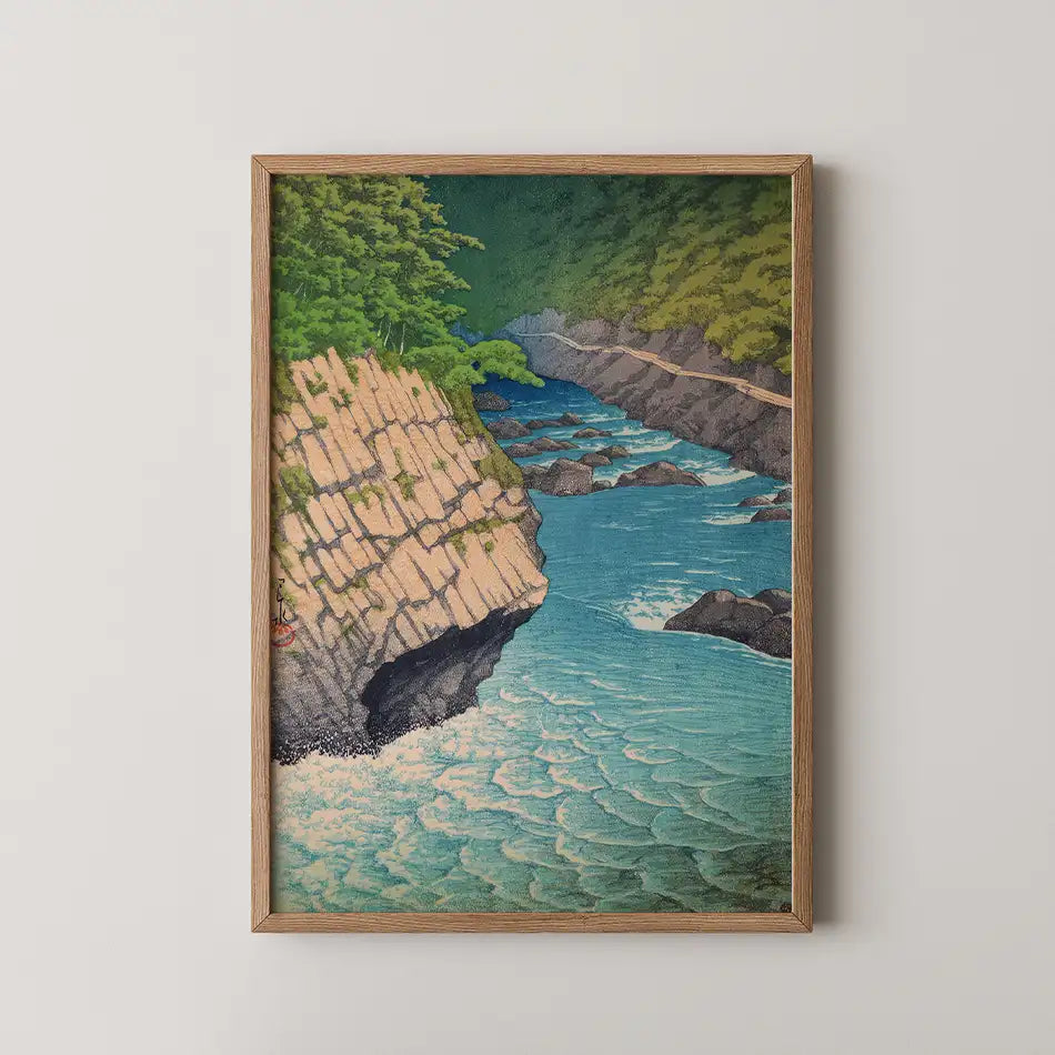 Hasui Kawase woodblock print of Jogakura Gorge at Hakkoda, a turquoise river winding between a striated cliff and pine covered slopes.