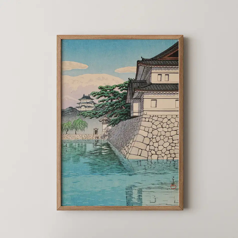 Hasui Kawase woodblock print of Kikyomon Gate at the Imperial Palace, a curved stone rampart and pine tree beside a calm turquoise moat.