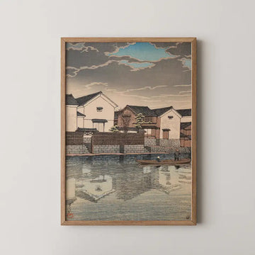 Hasui Kawase woodblock print of Matsue in Izumo, white walled houses along a canal reflected in still water as a boat passes at dusk.