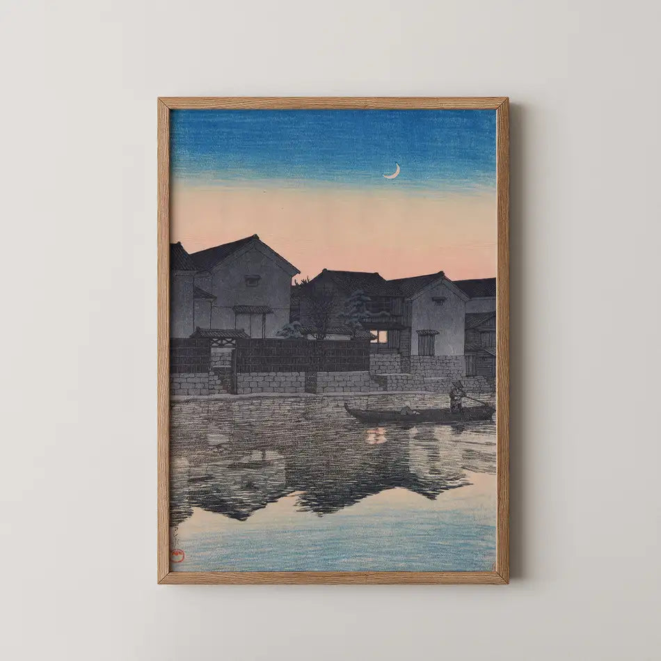 Hasui Kawase woodblock print of Matsue, Izumo at twilight, canal houses silhouetted under a crescent moon as a boatman crosses the water.