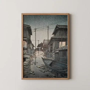 Hasui Kawase woodblock print of Night Rain at Kawarago, a flooded canal town with leaning houses and a moored boat in heavy rain.