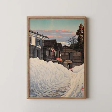Hasui Kawase woodblock print of Ojiya in Echigo, a snowbound village street at dusk with laundry hanging above deep snowdrifts.