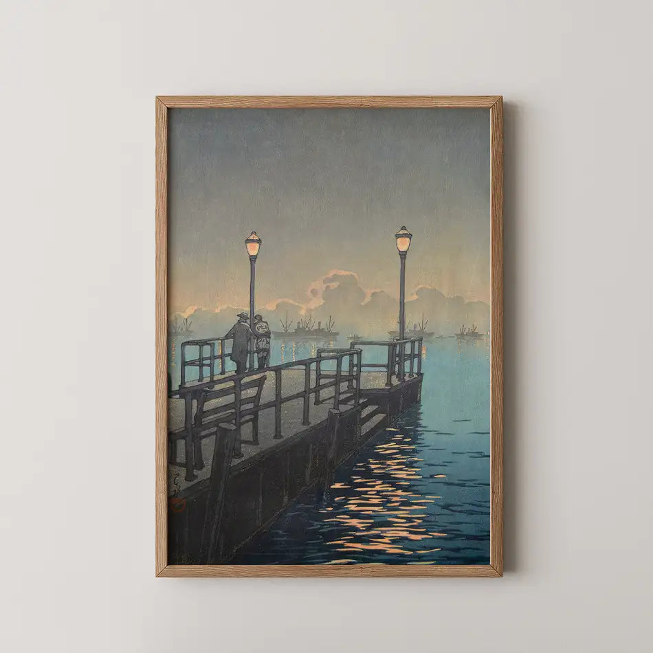 Hasui Kawase woodblock print of Otaru Harbor, two figures on a lamplit pier looking out at anchored ships in the dusk light.