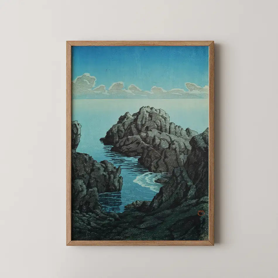 Hasui Kawase woodblock print of Shinkubo, Hachinohe, a narrow gap between dark rocky headlands opening onto a calm sea.