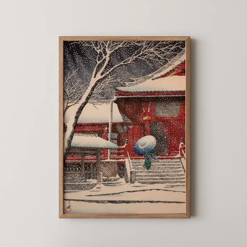 Hasui Kawase woodblock print of Snow at Kiyomizu Hall, Ueno, a red temple building under heavy snow with a figure crossing beneath a patterned umbrella.