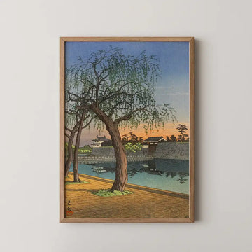 Hasui Kawase woodblock print of Spring Evening at Otemon Gate, a weeping willow beside the palace moat at sunset.