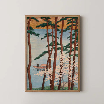 Hasui Kawase woodblock print of spring in Arashiyama, cherry blossom and pine trunks framing a small boat on the Katsura River.