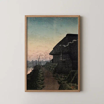 Hasui Kawase woodblock print of Sunset at Morigasaki, a thatched fisherman's hut with smoke rising against a pink and teal evening sky.