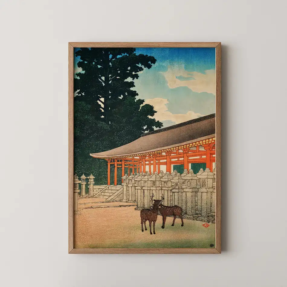 Hasui Kawase woodblock print of Kasuga Shrine in Nara, a red colonnade lined with stone lanterns and two deer resting nearby.