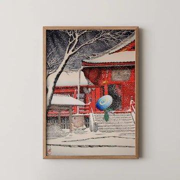 Hasui Kawase woodblock print of Ueno Kiyomizudo in Snow, a red temple hall under heavy snow with a figure crossing beneath a patterned umbrella.