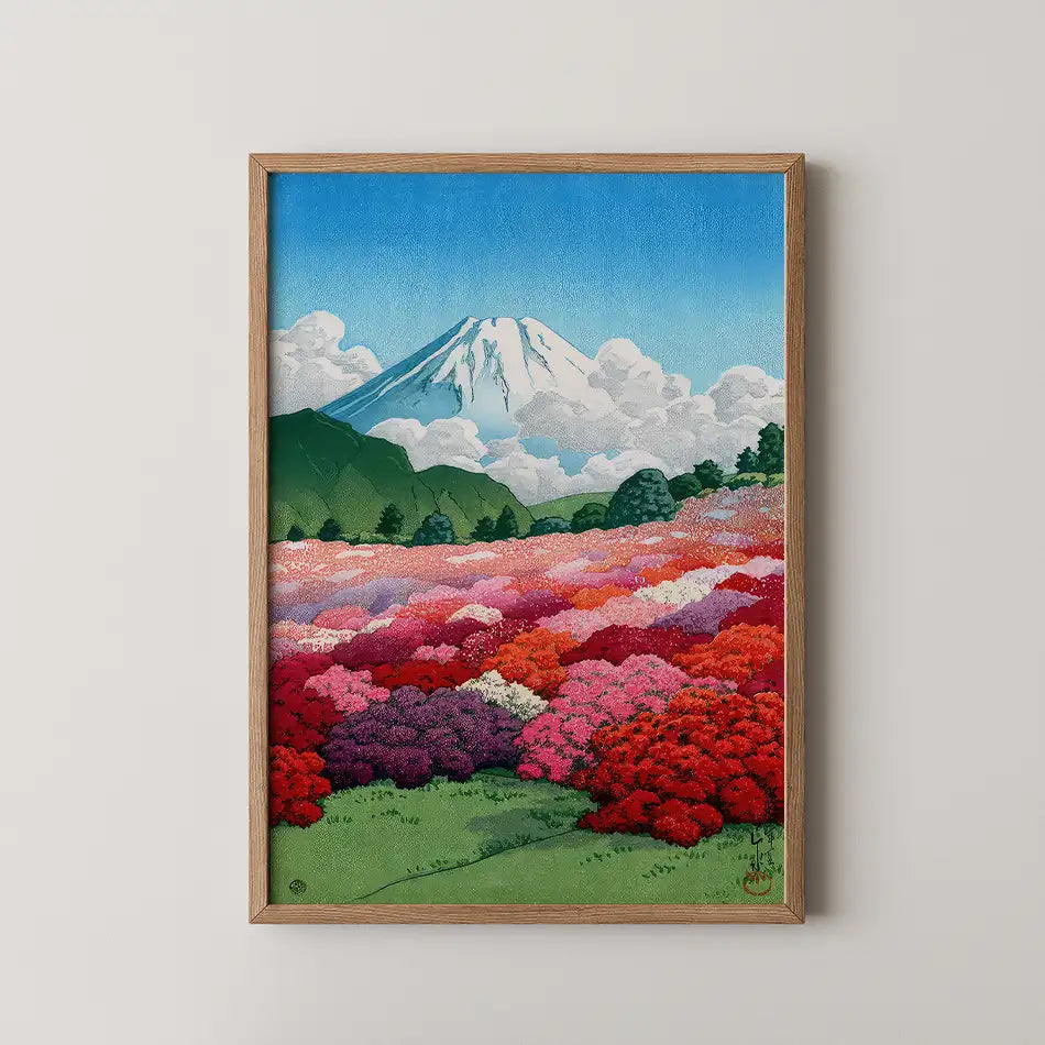 Hasui Kawase woodblock print of an azalea garden and Mount Fuji, red and pink blooms filling a hillside beneath the snow capped peak.
