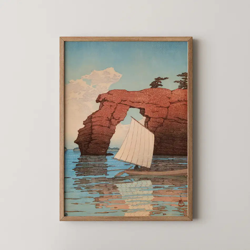 Hasui Kawase woodblock print of Zaimoku Island, Matsushima, a red stone arch framing a small sailboat crossing calm blue water.