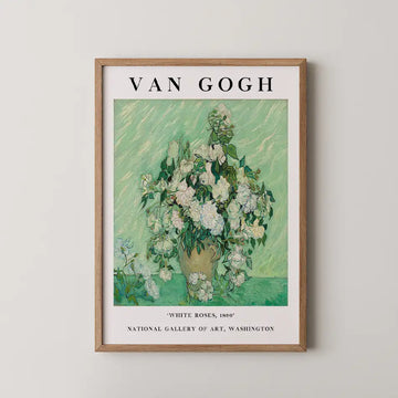 Van Gogh painting poster titled "White Roses, 1890," featuring a bouquet of white roses in a vase against a green background, framed in a wooden frame.