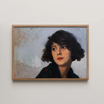 Portrait painting of a woman with curly hair, framed in wood, against a light background.