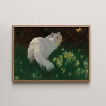 Painting of a white cat gazing at a butterfly in a grassy field, framed in a wooden border.