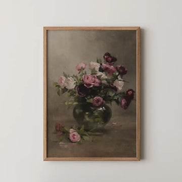 Vase of Roses, pink, white and burgundy roses massed in a round green vase on a dark tabletop.