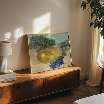 A colorful painting featuring a nest with yellow eggs, displayed in a well-lit living room setting on a wooden shelf beside a decorative table lamp.
