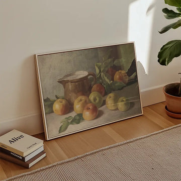Still life painting of apples and a ceramic jug, displayed in a cozy interior setting.