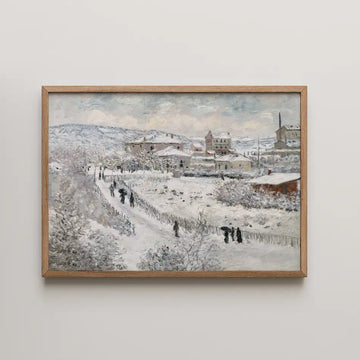 Painting of a snowy landscape with buildings and people walking along a path, framed in wood.