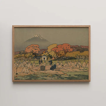 Framed painting of a rural landscape featuring harvesters, autumn trees, and Mount Fuji in the background.
