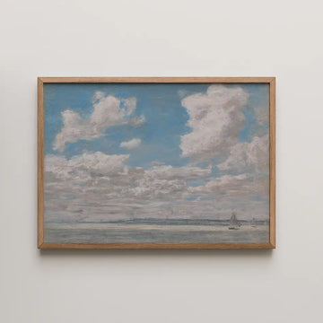 Painting of a serene sky with fluffy clouds over a calm sea, framed in natural wood.