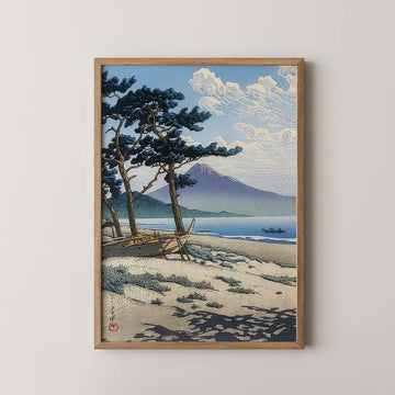 Framed painting of a serene landscape featuring pine trees, a calm sea, and a distant mountain under a partly cloudy sky.