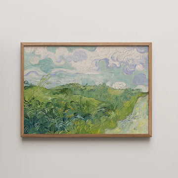 Vincent van Gogh painting titled Green Wheat Fields, Auvers, rolling green wheat beneath a swirling sky of pale clouds with a sandy path curving through the field.