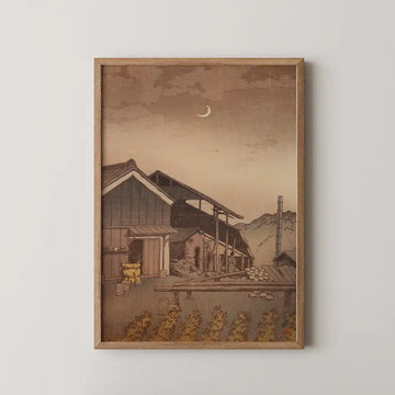 Vintage-inspired painting of a rural landscape featuring a wooden house, mountains in the background, and a crescent moon in the sky, framed in natural wood.