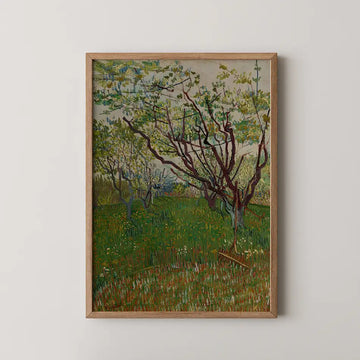 Framed painting of a blossoming orchard with lush green grass and trees in a serene landscape.