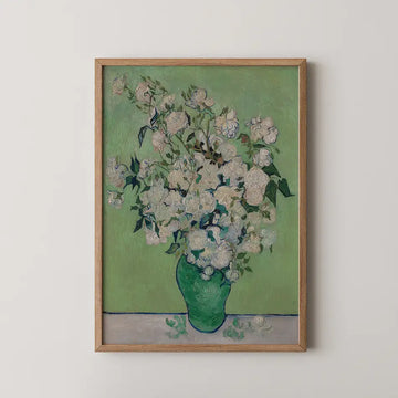 Painting of white flowers in a green vase on a light green background, framed in natural wood.