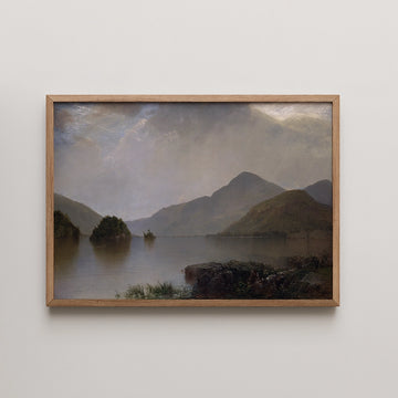 Framed landscape painting of mountains reflecting in a calm lake under a cloudy sky