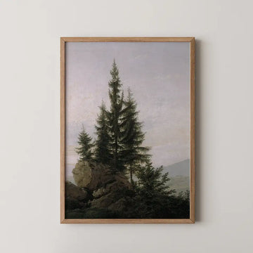 Framed painting of coniferous trees on a rocky landscape with a soft pastel sky in the background.