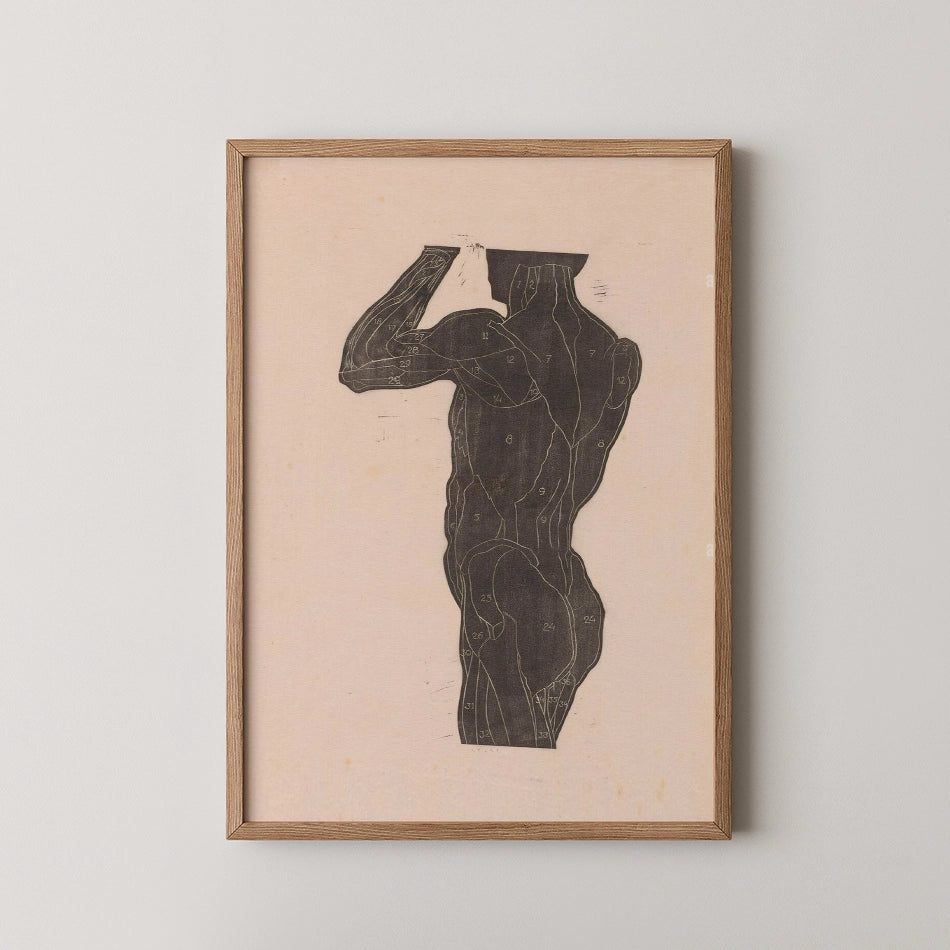 Black silhouette of a male figure on soft pink background, framed in wood.