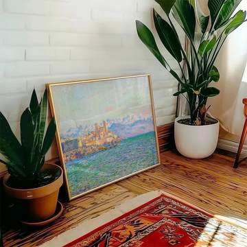 A colorful painting of a castle by the sea displayed in a stylish living room setting with plants and wooden flooring.
