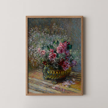 A vibrant painting of a bouquet of pink roses and white flowers in a decorative yellow vase, framed and displayed on a light-colored wall.