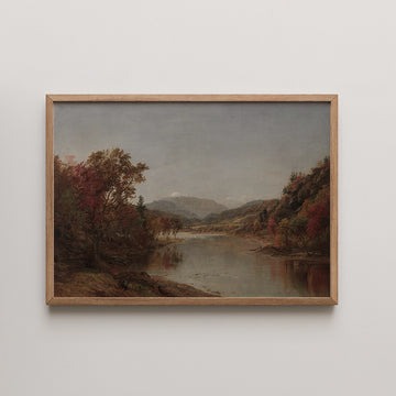 Landscape painting of a serene river flanked by autumn trees, framed in natural wood.