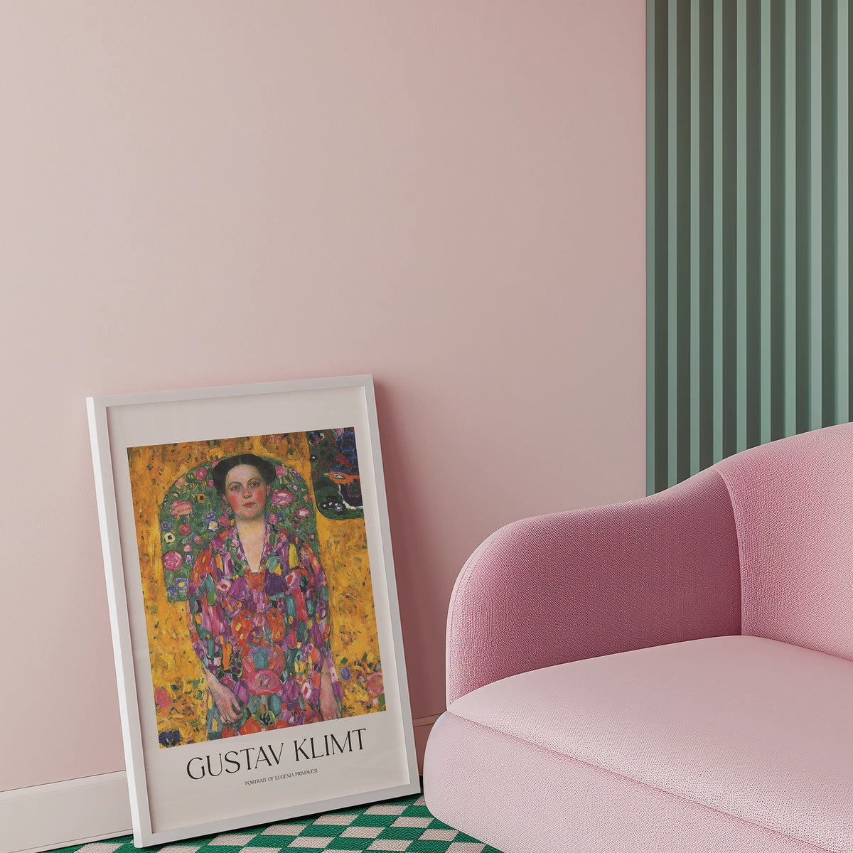 Framed Gustav Klimt painting titled "Portrait of Adele Bloch-Bauer I" leaning against a pink wall next to a modern pink sofa.