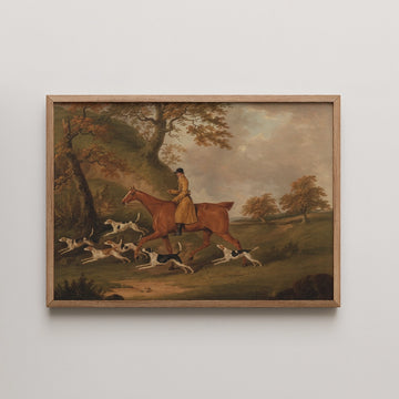 A classic painting featuring a rider on a horse accompanied by a pack of hunting dogs, set in a scenic landscape with trees and rolling hills.