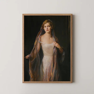 Portrait of a woman in a light dress with flowing fabric draped around her, framed in wood, set against a dark background.