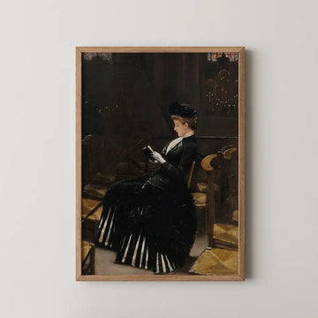 Victorian woman sitting and reading in a church, wearing a black dress and hat, framed painting on a white wall.