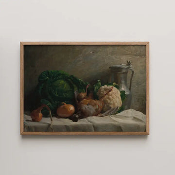 Still life painting featuring vegetables and a silver pitcher in a wooden frame.