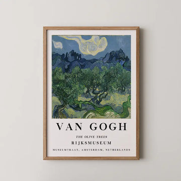 Vincent van Gogh painting titled The Olive Trees, twisted silver green olive trees against jagged blue mountains and a swirling pale sky.