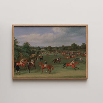 Historical painting of a horse racing scene with multiple riders and spectators in a green landscape, framed in wood.