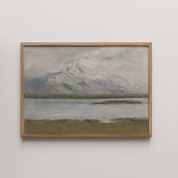 Mountain landscape painting with muted colors and a wooden frame, featuring a lake in the foreground and snow-capped peaks in the background.